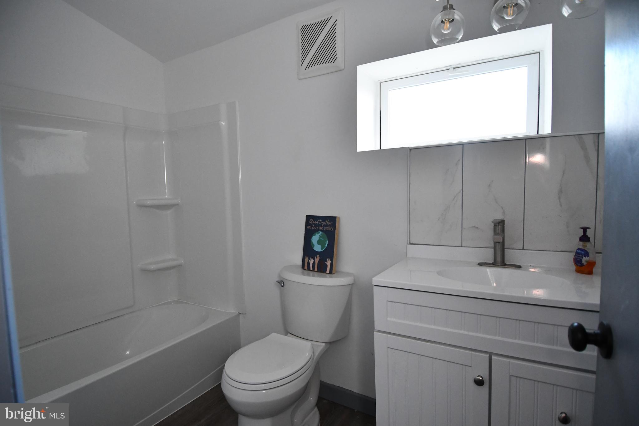 780 White Hall Road Littlestown, PA 17340 - Photo 14 of 19 a bathroom with a sink a toilet and shower