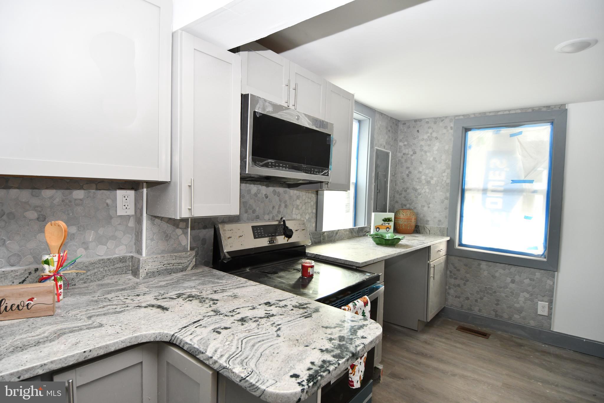 780 White Hall Road Littlestown, PA 17340 - Photo 4 of 19 a kitchen with a sink and a stove top oven