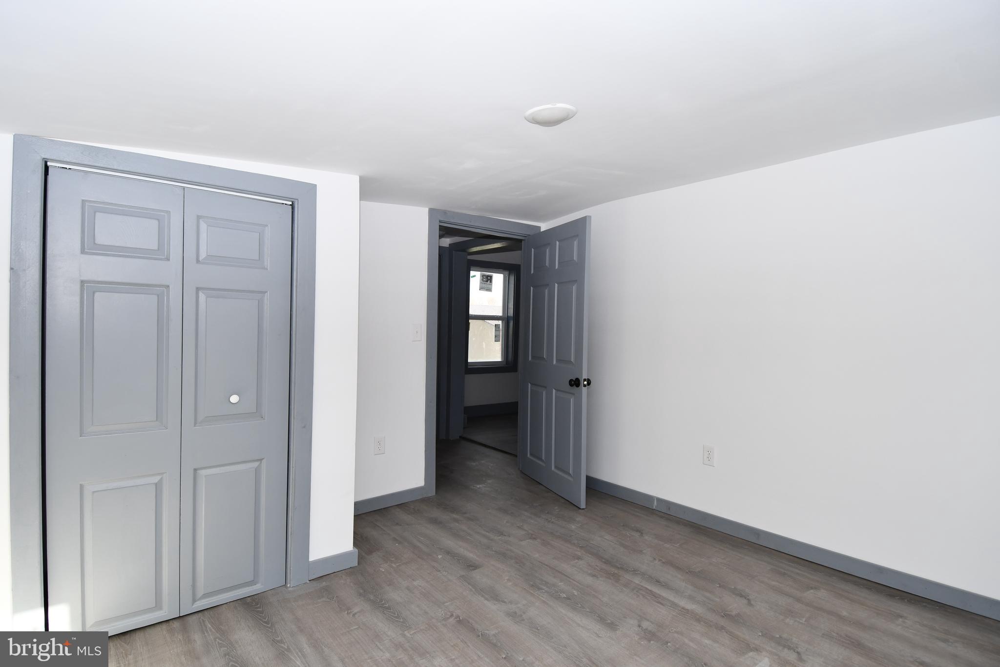 780 White Hall Road Littlestown, PA 17340 - Photo 9 of 19 an empty room with wooden floor and closet