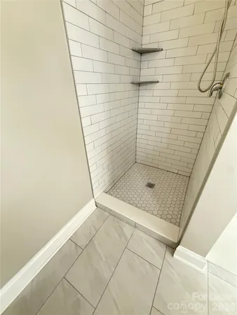 a bathroom with a bath tub