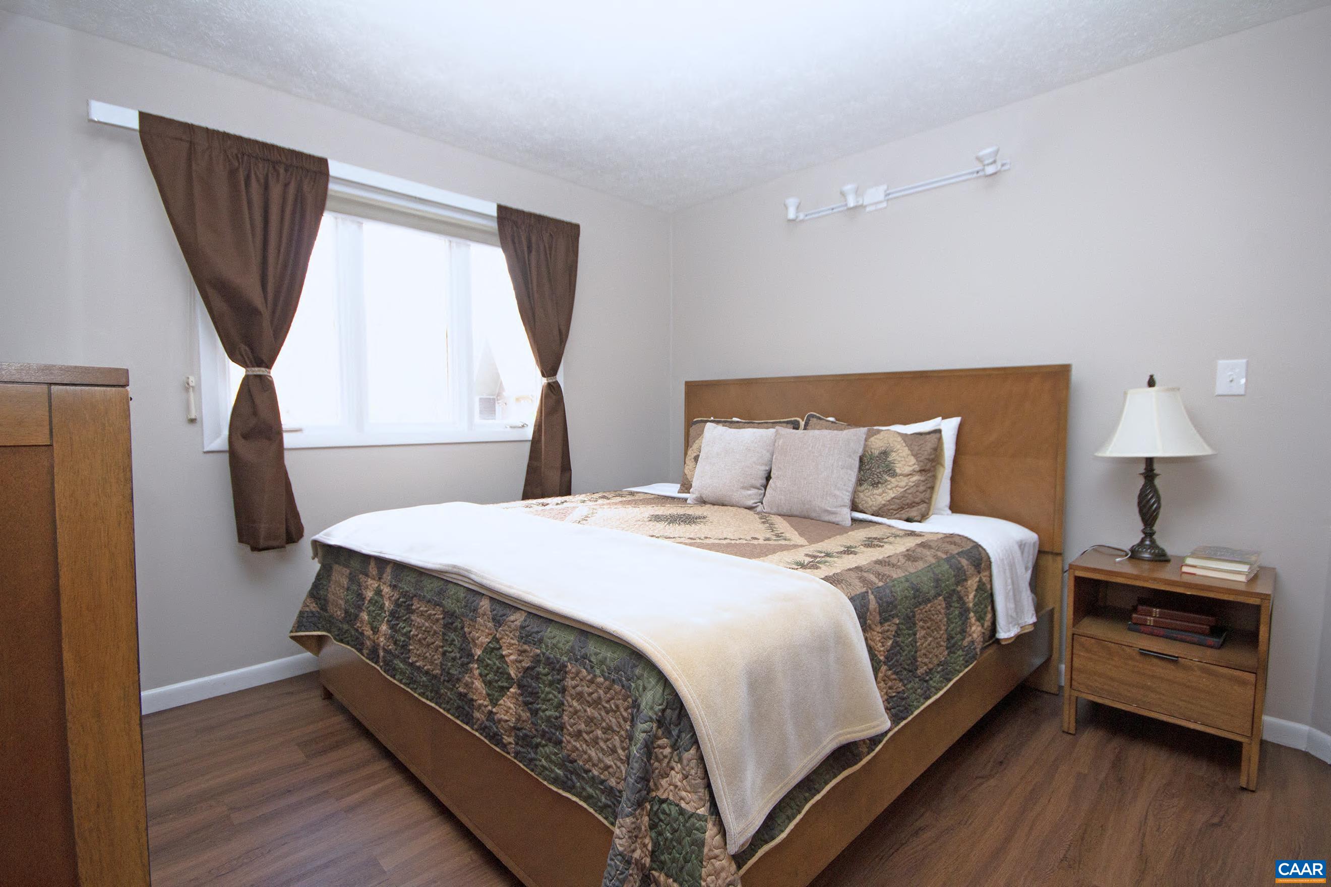 487 3 Ridges Roseland, VA 22967 - Photo 11 of 20 a bed room with a bed and a window