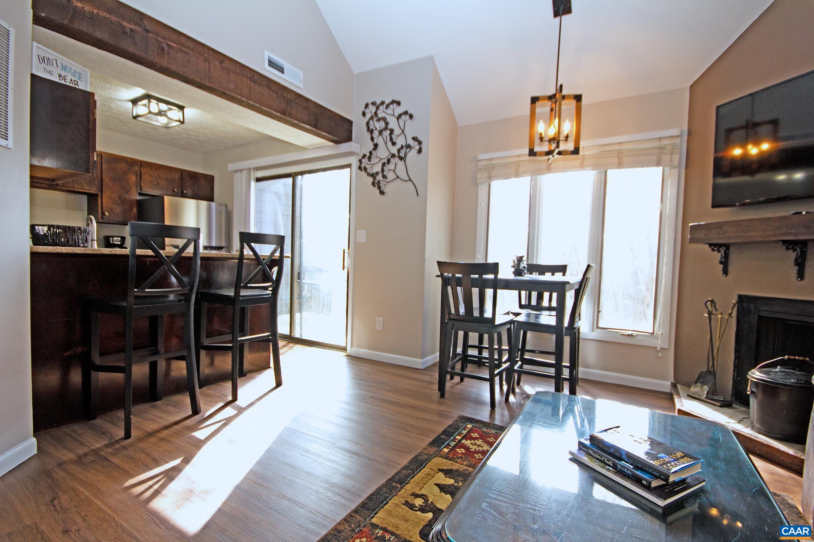 487 3 Ridges Roseland, VA 22967 - Photo 4 of 20 a view of a dining room with furniture window and wooden floor