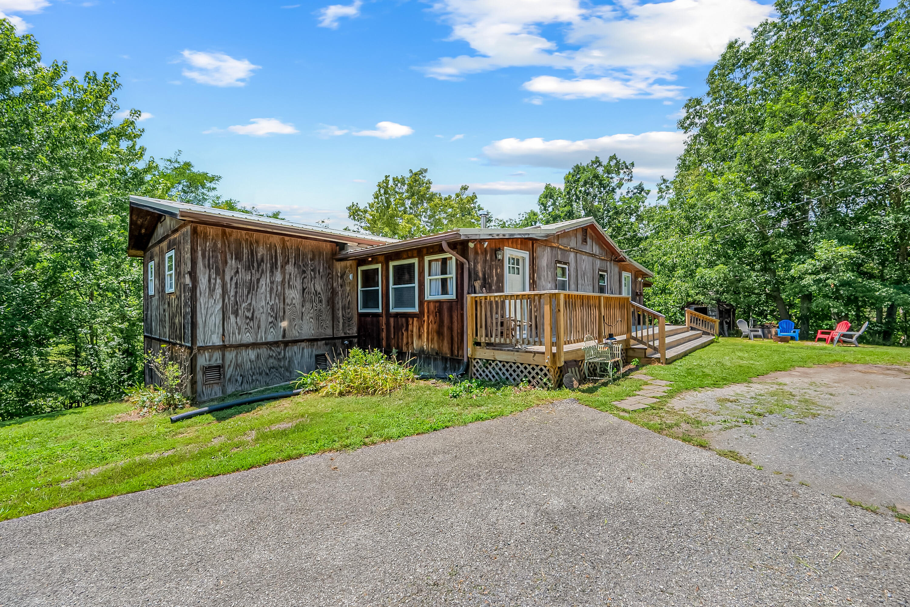 2389 Reesedale Road Elliston, VA 24087 - Photo 1 of 62 a view of an house with backyard and garden