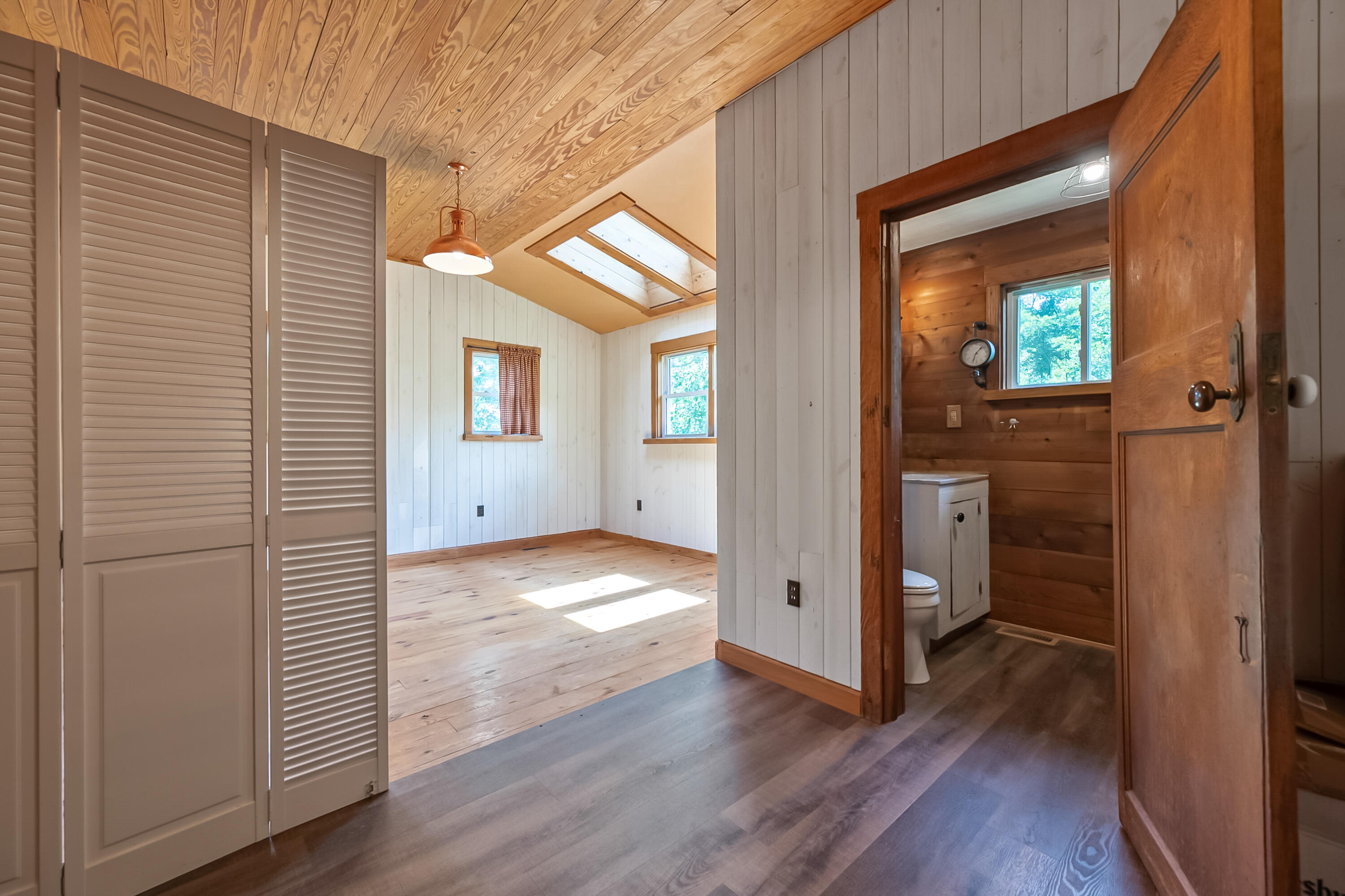2389 Reesedale Road Elliston, VA 24087 - Photo 29 of 62 a view of a hallway with wooden floor and closet area