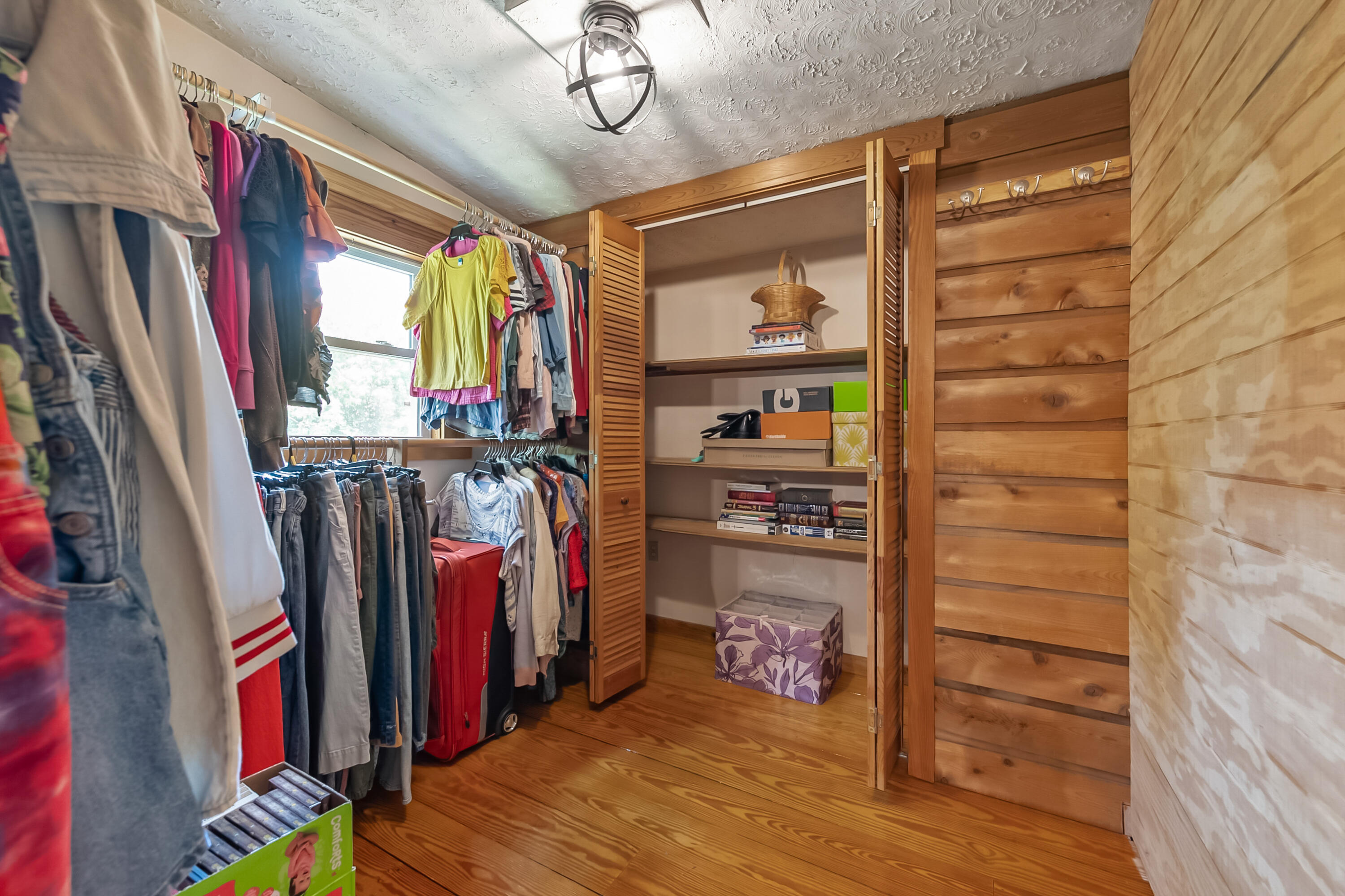 2389 Reesedale Road Elliston, VA 24087 - Photo 42 of 62 a view of walk in closet with clothes and shoes