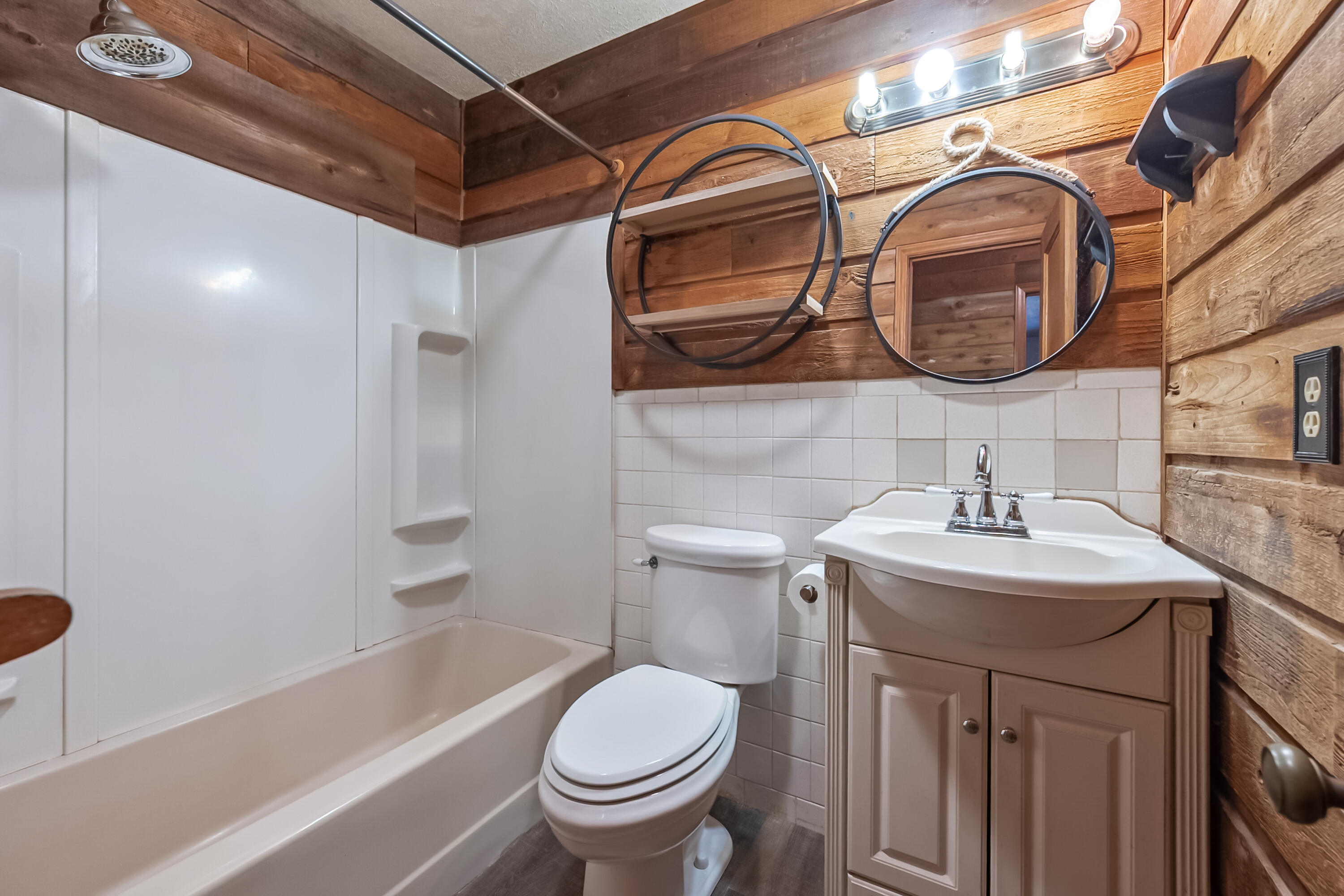 2389 Reesedale Road Elliston, VA 24087 - Photo 43 of 62 a bathroom with a sink and a mirror