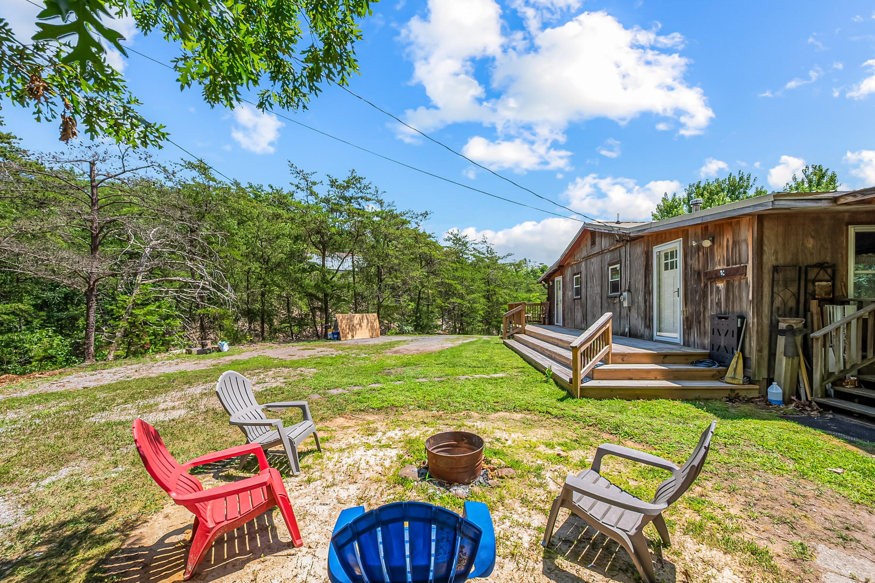 2389 Reesedale Road Elliston, VA 24087 - Photo 5 of 62 a view of a wooden chairs and table in the patio