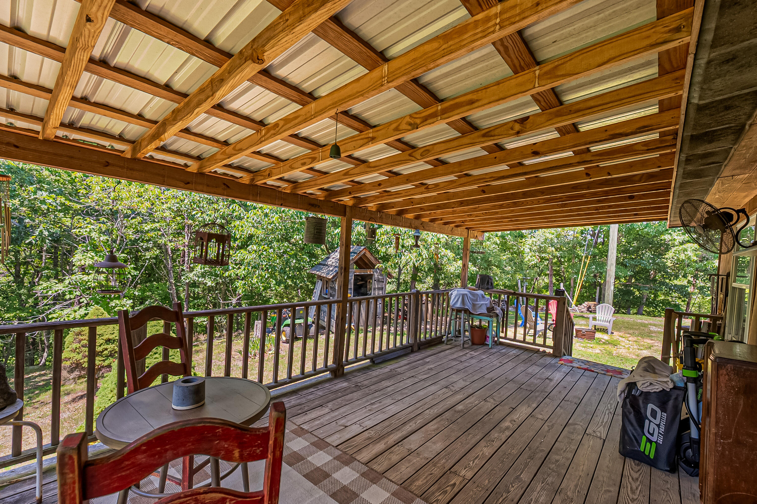2389 Reesedale Road Elliston, VA 24087 - Photo 49 of 62 a porch with wooden floor in outdoor space