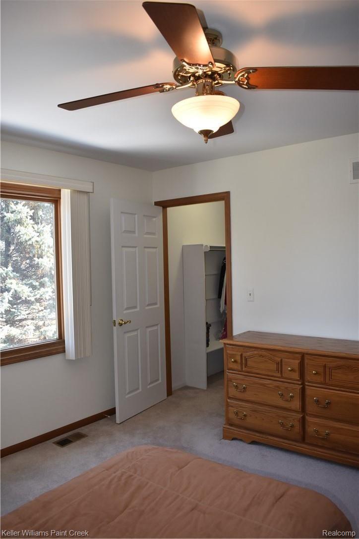 1993 Ridgefield Court Rochester, MI 48306 - Photo 38 of 47 THE OPEN DOOR IN BEDROOM #4 LEADS TO THE LARGE WALK-IN CLOSET (4 X 7)