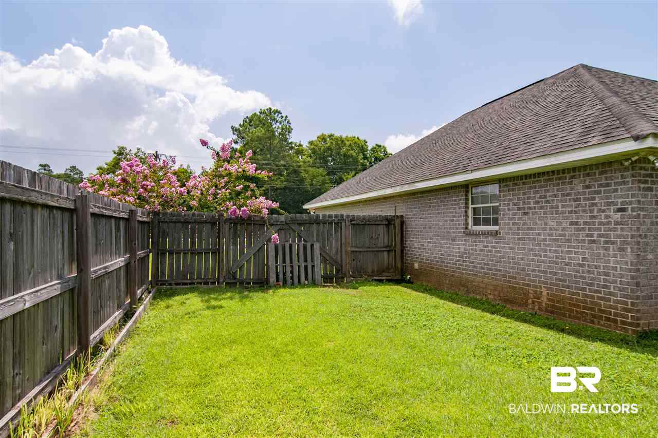 22165 Buck Road Robertsdale, AL 36567 - Photo 34 of 39 Fenced in Backyard