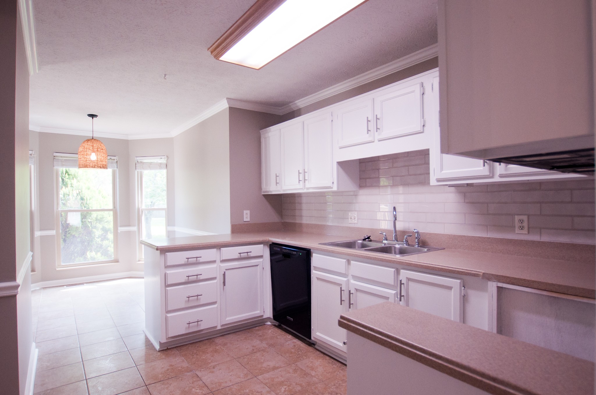 309 Chesterfield Circle Madison, TN 37115 - Photo 2 of 27 a kitchen with a sink stove and cabinets