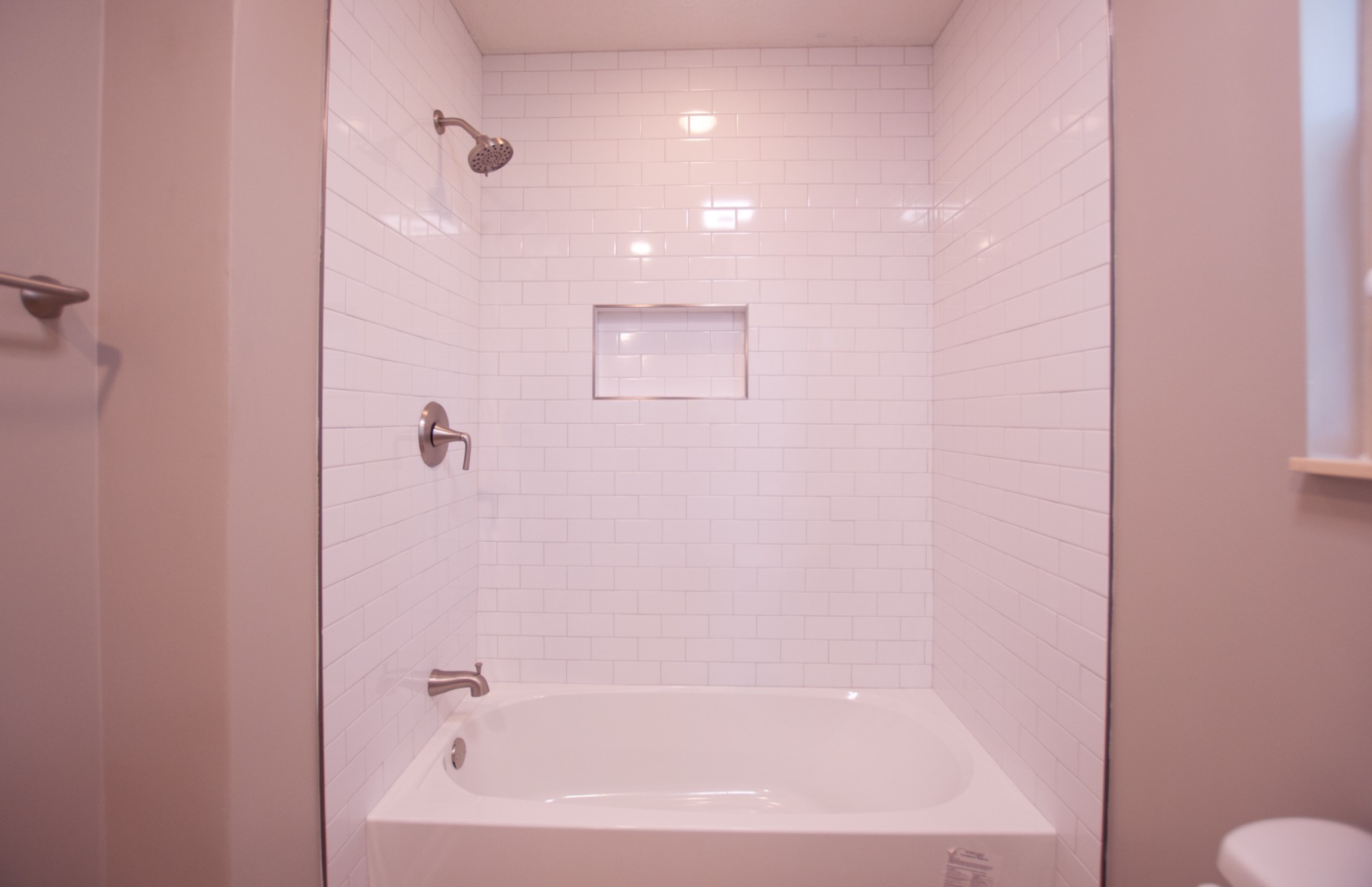 309 Chesterfield Circle Madison, TN 37115 - Photo 23 of 27 a bathroom with a bathtub and shower