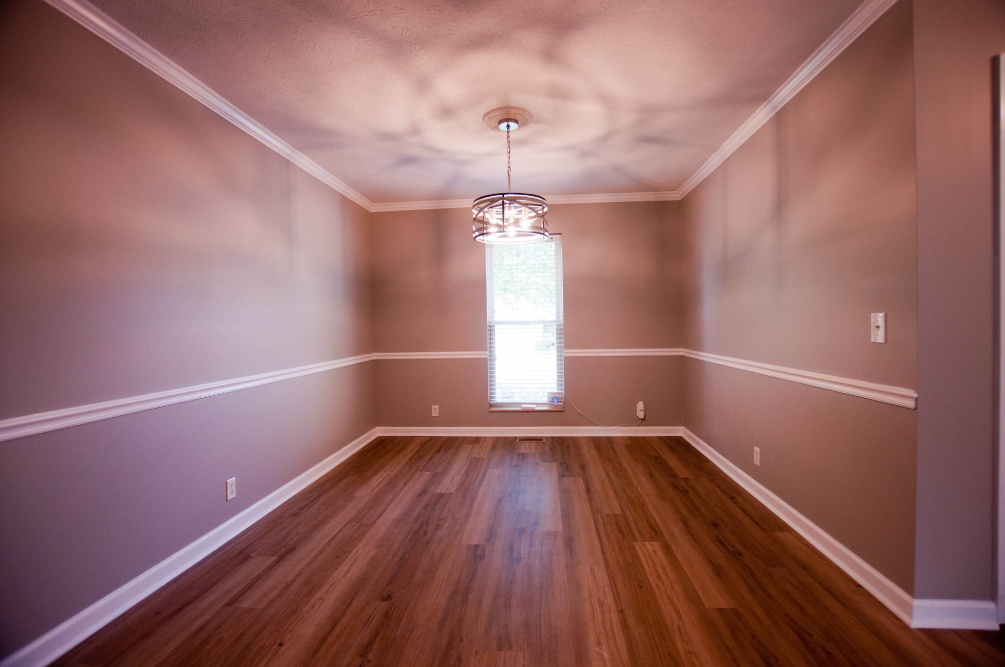 309 Chesterfield Circle Madison, TN 37115 - Photo 10 of 27 a view of empty room with wooden floor and fan