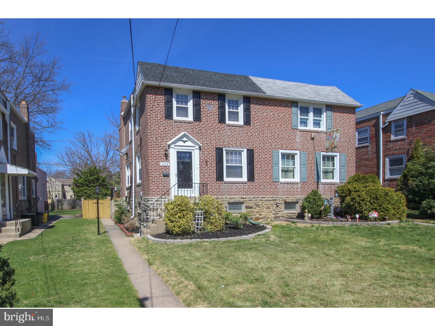346 Ballymore Road Springfield, PA 19064 - Photo 1 of 24 a front view of a house with a yard