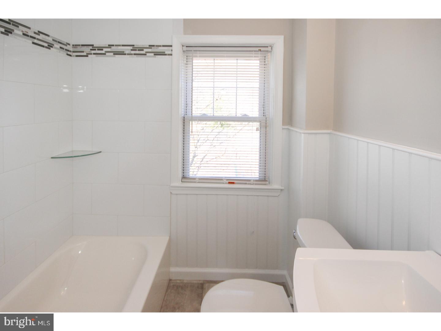 346 Ballymore Road Springfield, PA 19064 - Photo 15 of 24 a bathroom with a bathtub and a window