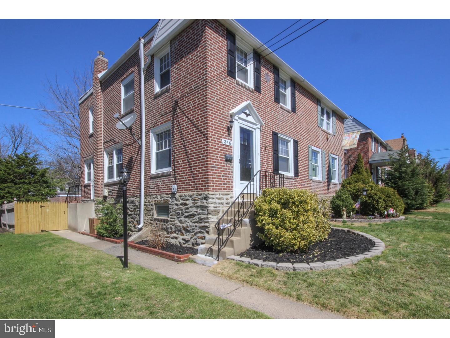 346 Ballymore Road Springfield, PA 19064 - Photo 2 of 24 a front view of a house with a yard