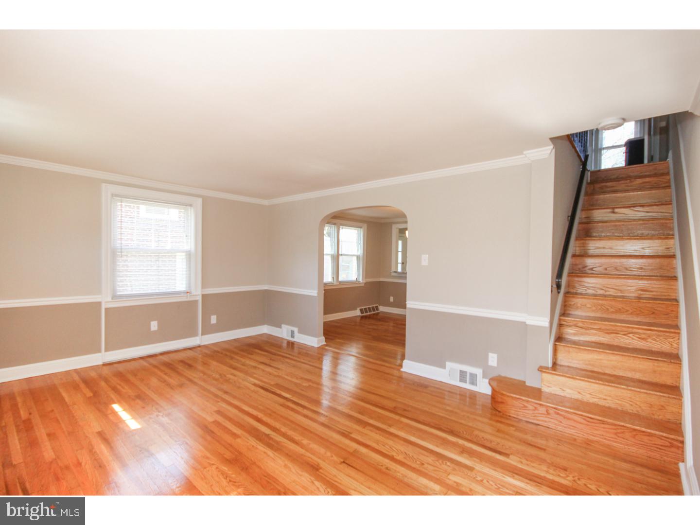 346 Ballymore Road Springfield, PA 19064 - Photo 3 of 24 a view of empty room with wooden floor and fan