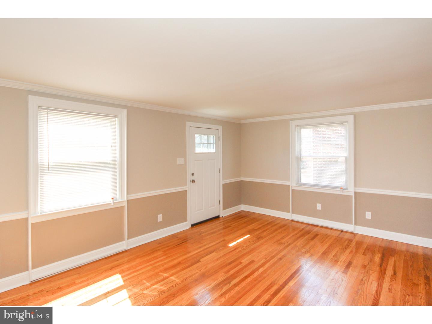 346 Ballymore Road Springfield, PA 19064 - Photo 4 of 24 a view of empty room with wooden floor and fan