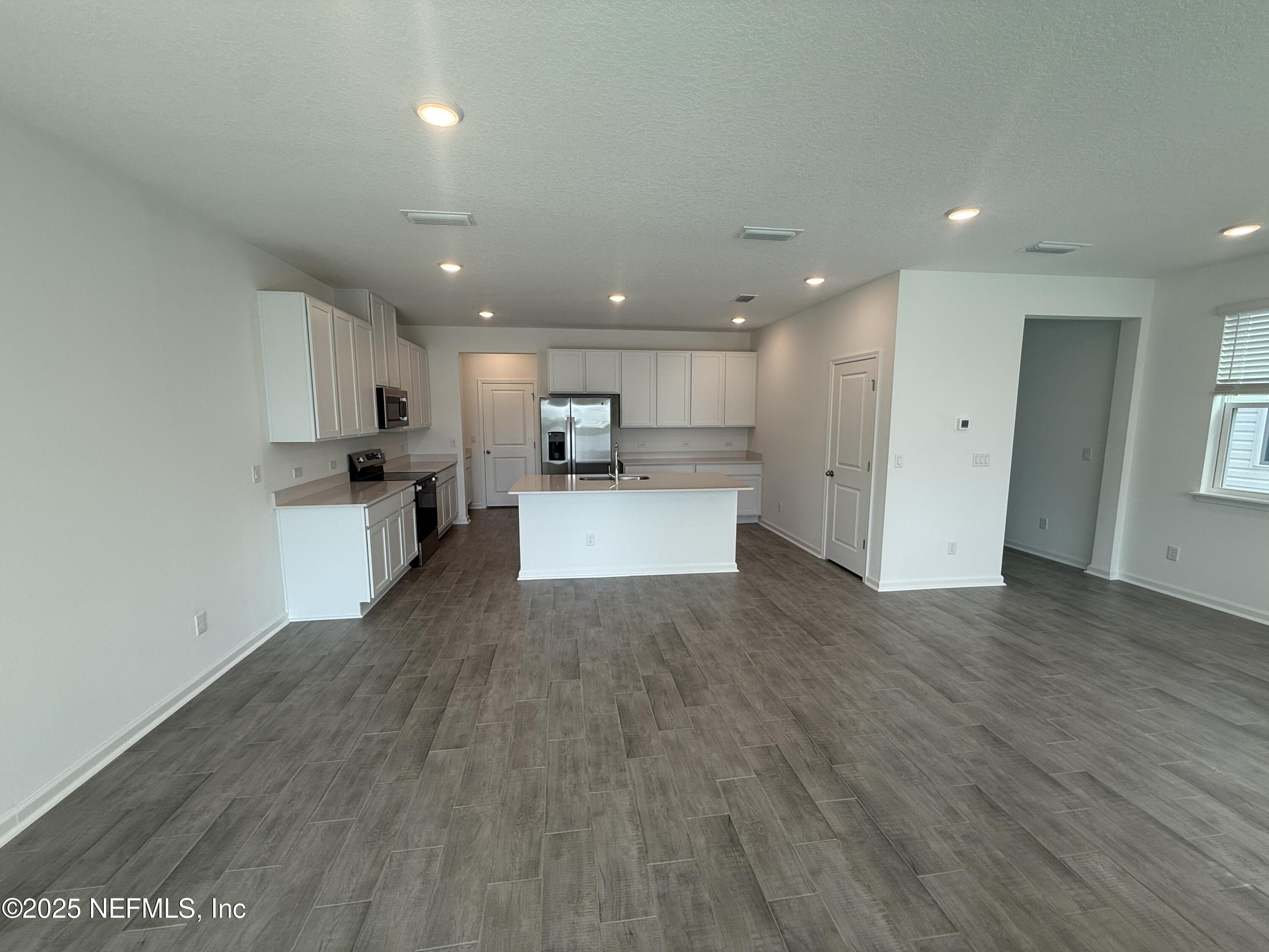 6850 Rhapsody Road Jacksonville, FL 32244 - Photo 11 of 47 LIVING DINING KITCHEN