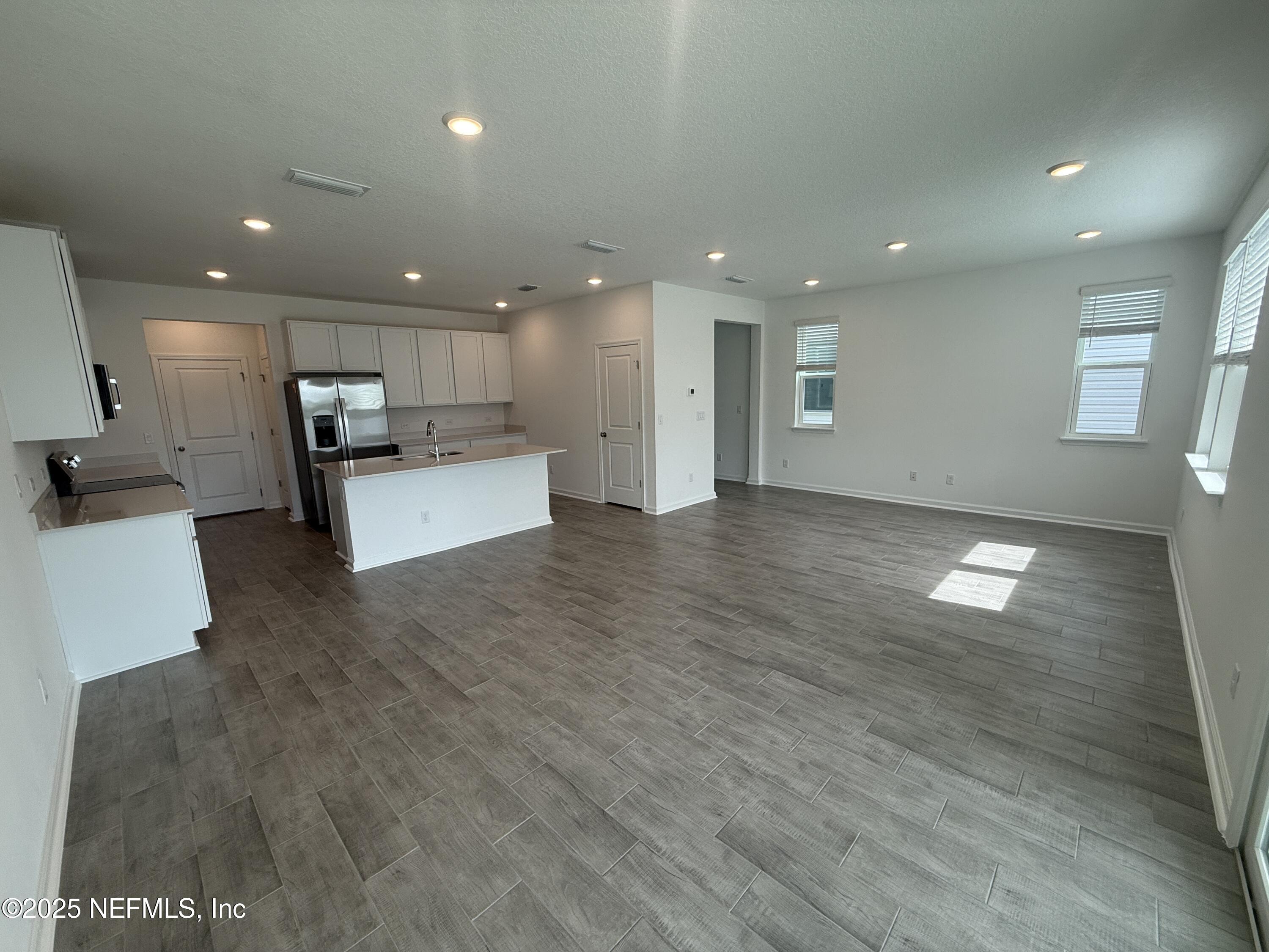 6850 Rhapsody Road Jacksonville, FL 32244 - Photo 12 of 47 LIVING DINING KITCHEN