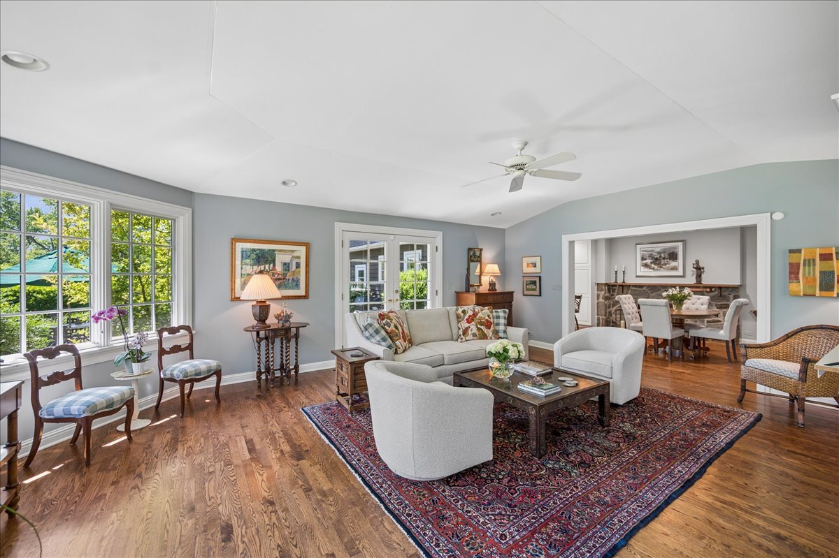 253 Summerfield Road Northbrook, IL 60062 - Photo 21 of 46 a living room with furniture or couch and a table
