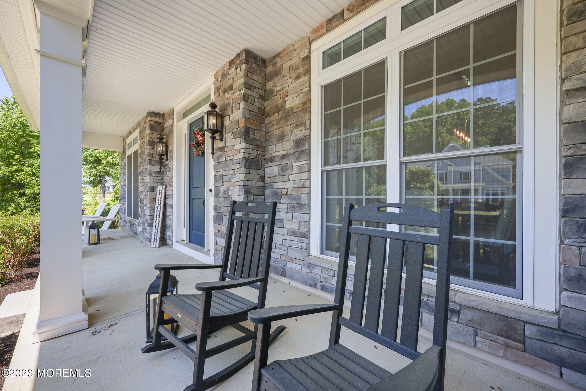 66 Windermere Road Lincroft, NJ 07738 - Photo 4 of 48 a view of a balcony with chairs