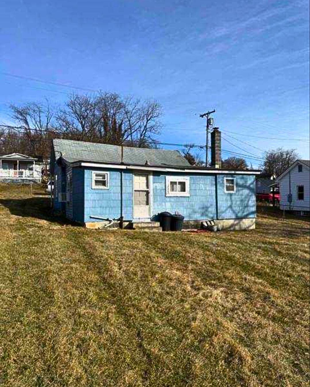 2409 2nd Street Radford, VA 24141 - Photo 11 of 14 a front view of a house with a yard
