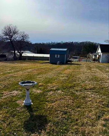 a swimming pool with an outdoor seating