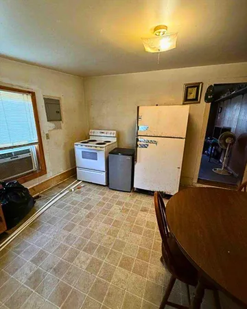 a storage room with washer and dryer