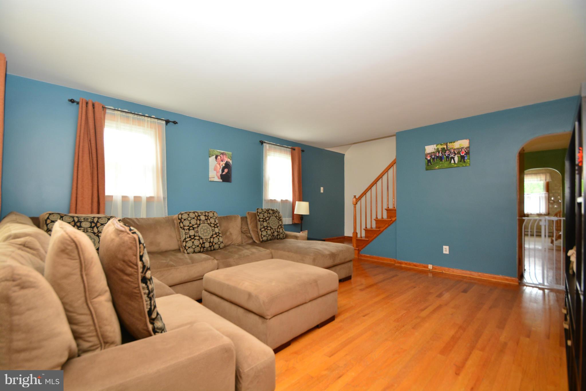 4910 Forge Road Perry Hall, MD 21128 - Photo 2 of 25 a living room with furniture and a flat screen tv