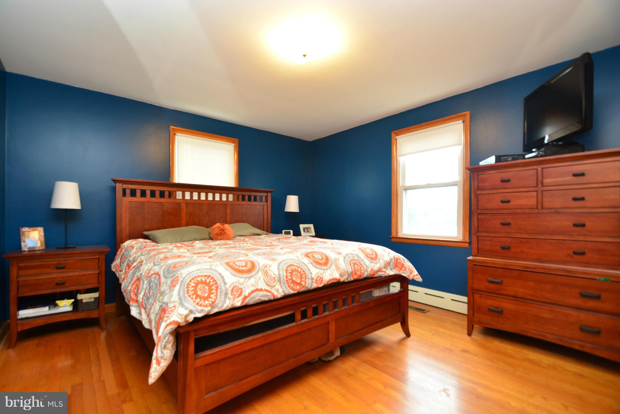 4910 Forge Road Perry Hall, MD 21128 - Photo 12 of 25 a bedroom with a bed and a tv