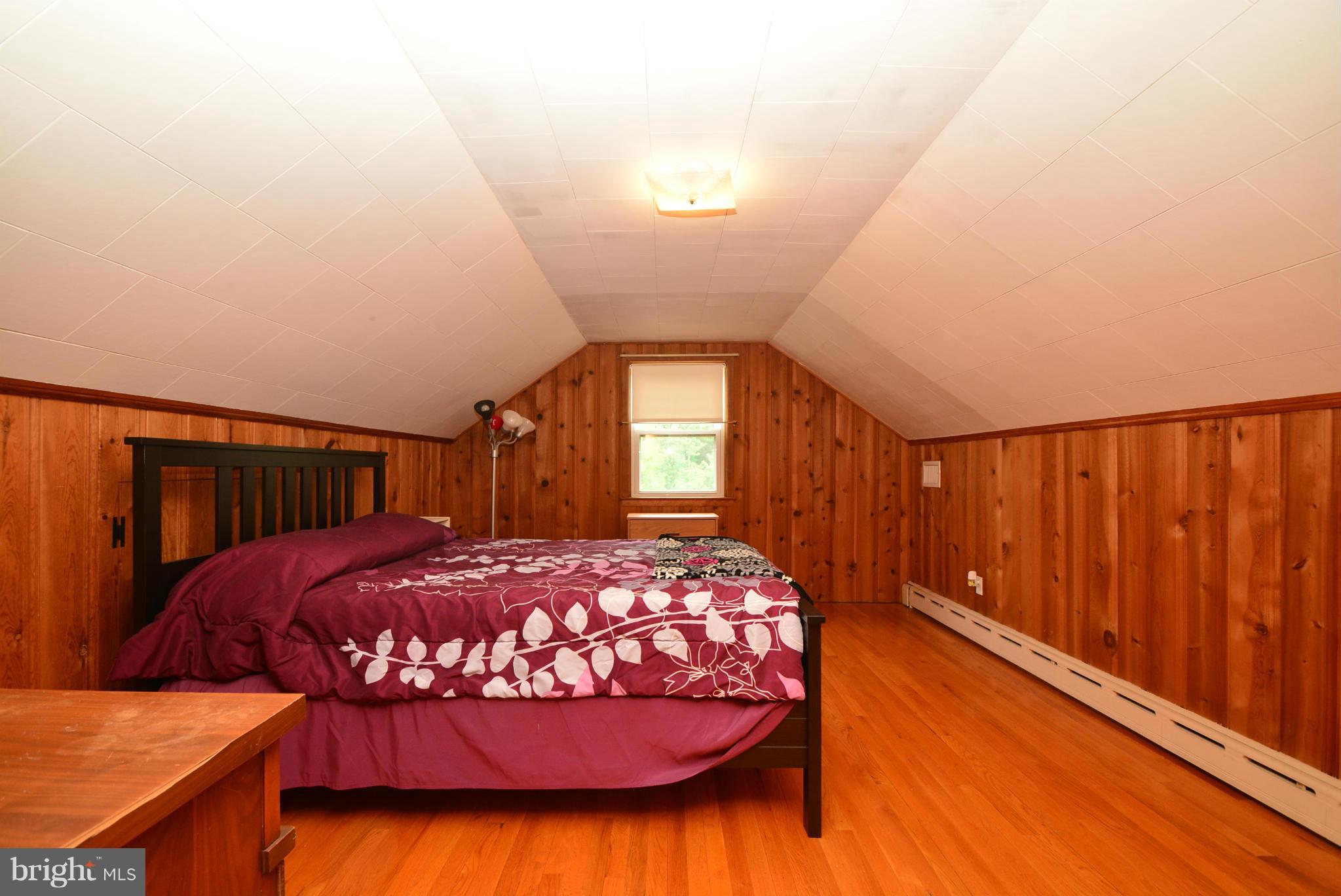 4910 Forge Road Perry Hall, MD 21128 - Photo 16 of 25 a bedroom with a bed and window