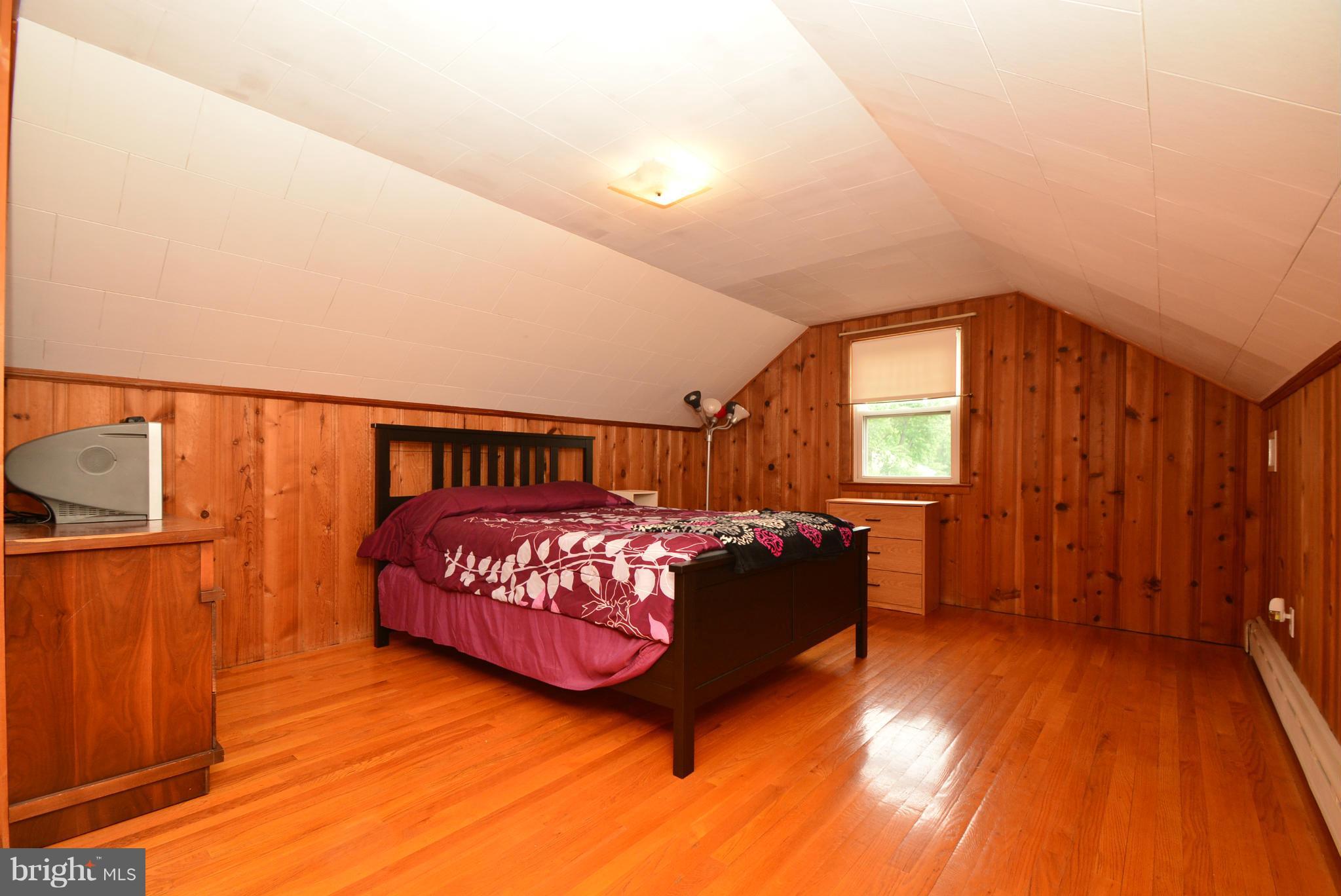 4910 Forge Road Perry Hall, MD 21128 - Photo 17 of 25 a bedroom with a bed and window