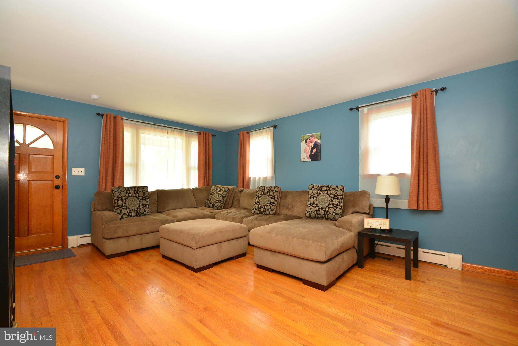 4910 Forge Road Perry Hall, MD 21128 - Photo 3 of 25 a living room with furniture and a window