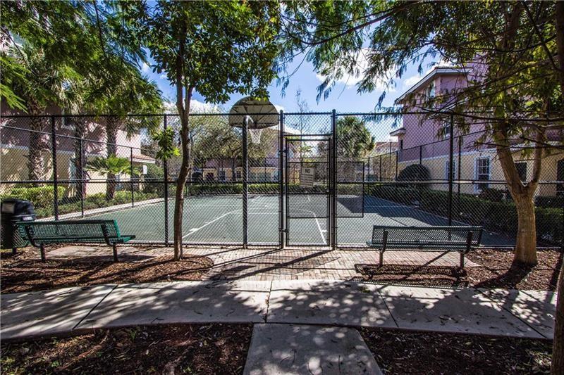 6670 West Sample Road, Unit 6670 Coral Springs, FL 33067 - Photo 13 of 16 a view of a park with iron fence