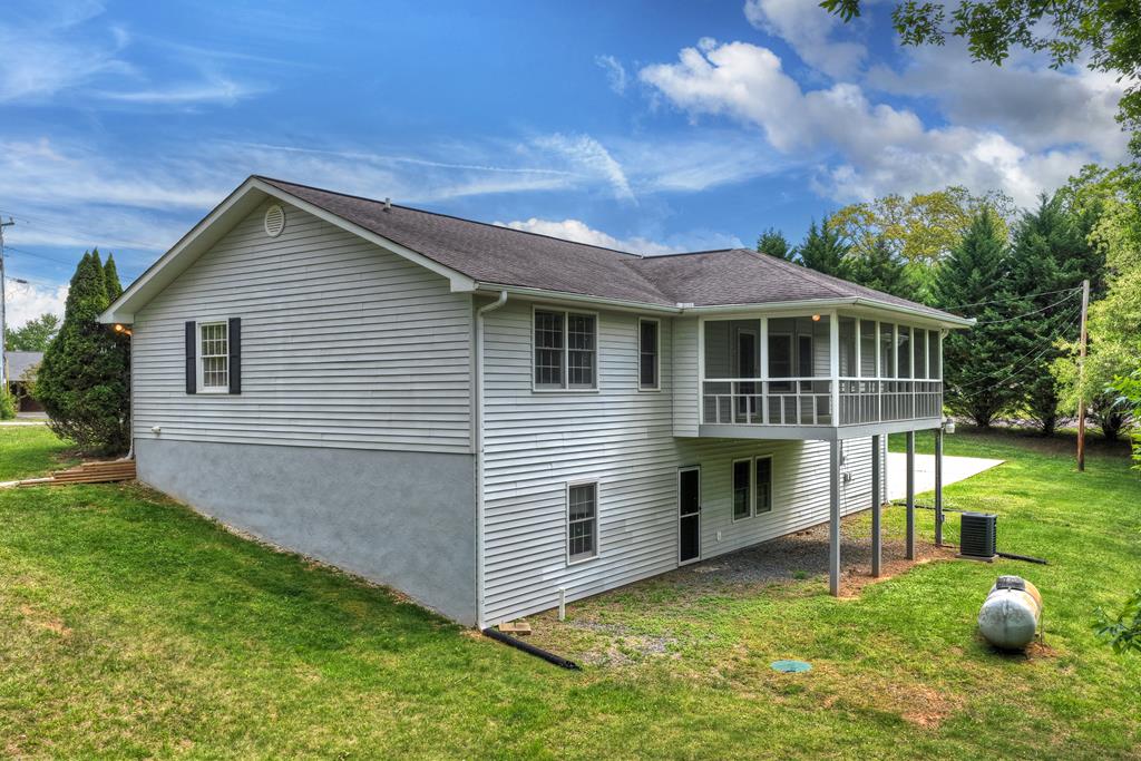380 La Vista Drive Blue Ridge, GA 30513 - Photo 12 of 48 a view of a house with a yard