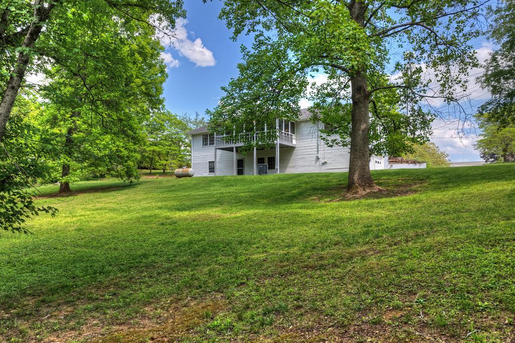 380 La Vista Drive Blue Ridge, GA 30513 - Photo 16 of 48 a view of a house with a big yard