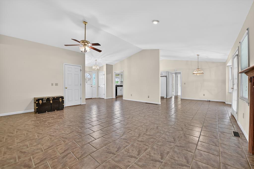 380 La Vista Drive Blue Ridge, GA 30513 - Photo 29 of 48 a view of a livingroom with a furniture ceiling fan and window