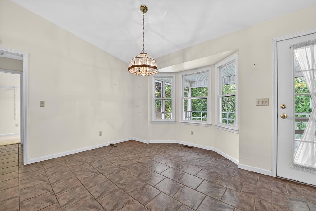 380 La Vista Drive Blue Ridge, GA 30513 - Photo 31 of 48 a view of an empty room with a window