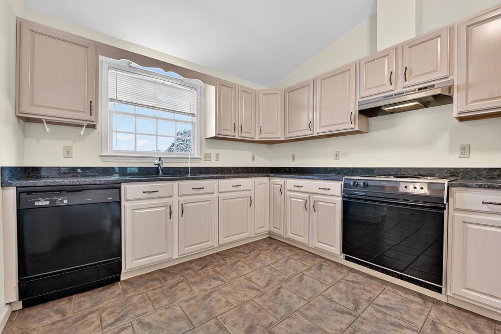 380 La Vista Drive Blue Ridge, GA 30513 - Photo 35 of 48 a kitchen with granite countertop cabinets stainless steel appliances and a sink