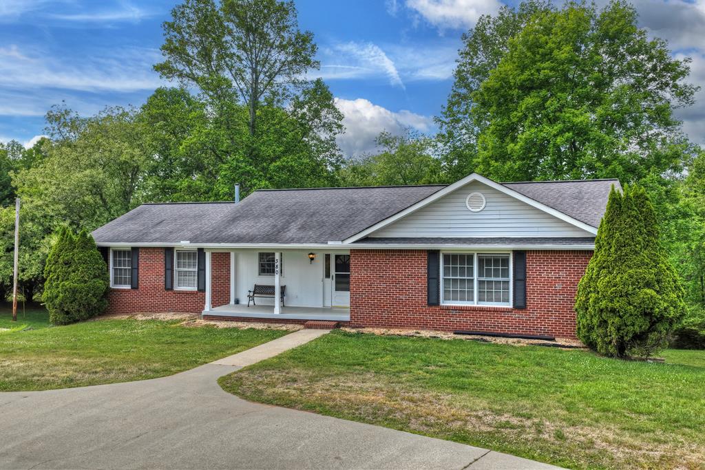 380 La Vista Drive Blue Ridge, GA 30513 - Photo 5 of 48 a front view of a house with a yard
