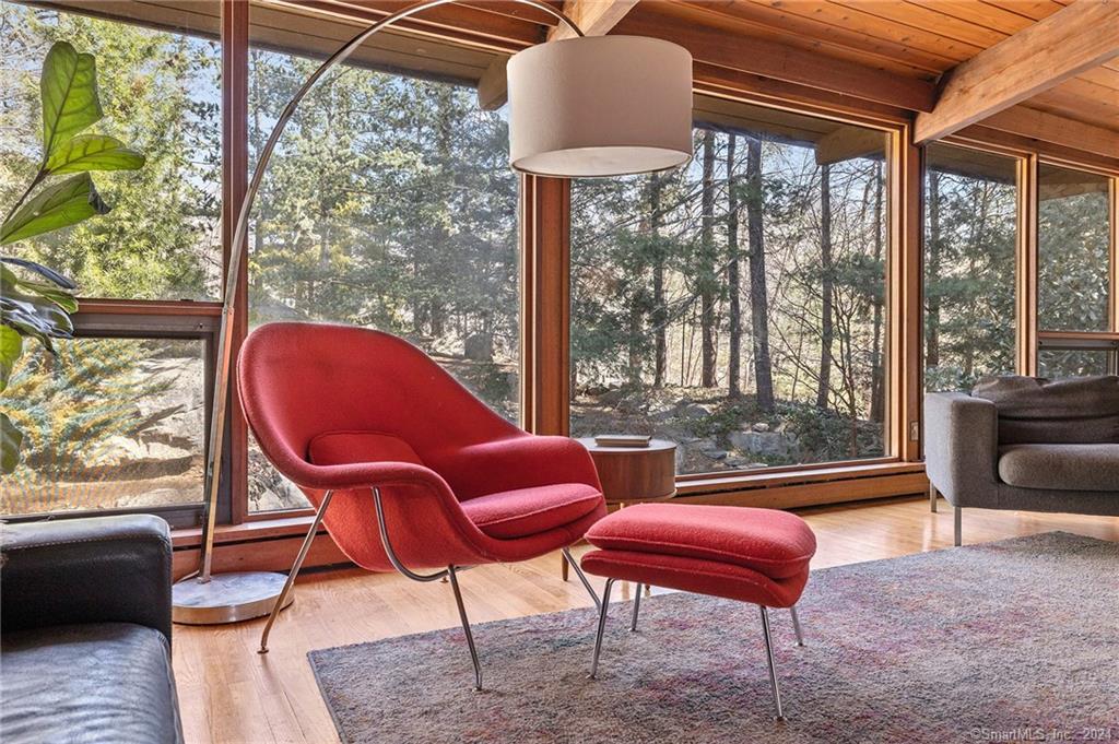 a outdoor living space with furniture and a potted plant