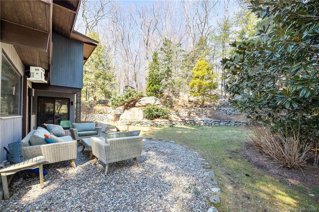 47 Florida Hill Road Ridgefield, CT 06877 - Photo 25 of 29 a living room with a couch and a table