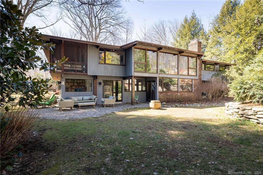 47 Florida Hill Road Ridgefield, CT 06877 - Photo 26 of 29 a view of a house with a yard and sitting area