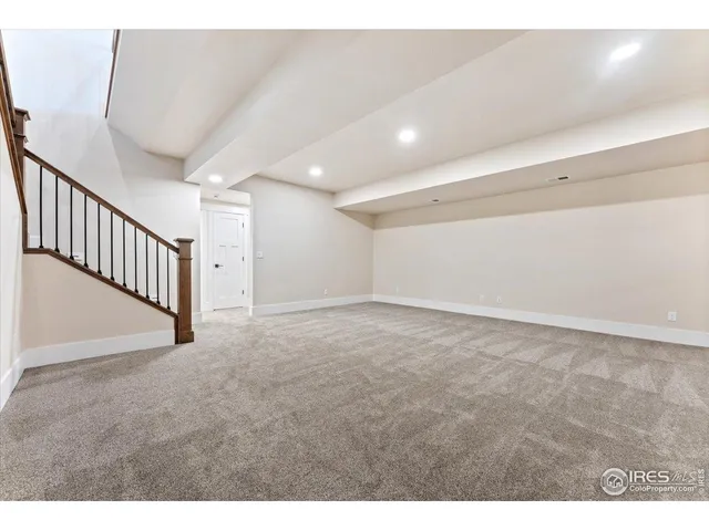 a view of kitchen and refrigerator