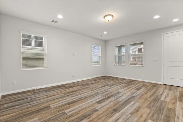 a view of a park with large trees