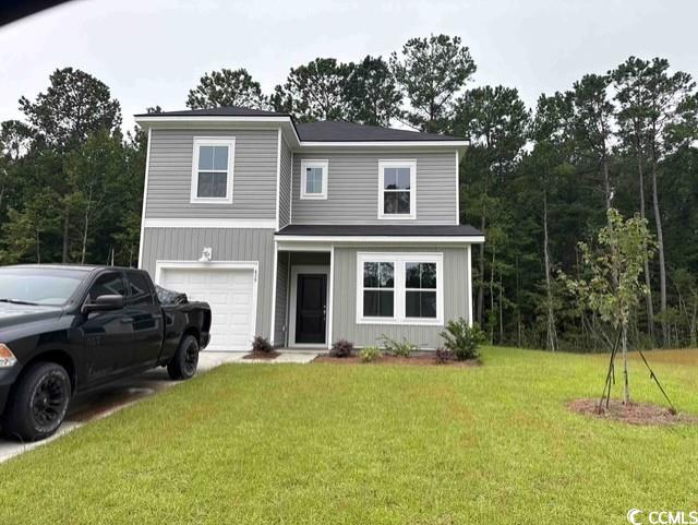 439 Falling Leaf Loop Myrtle Beach, SC 29588 - Photo 1 of 14 Traditional-style house featuring an attached gara