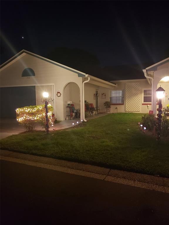 240 Division Street Clermont, FL 34711 - Photo 2 of 16 a view of a house with a porch