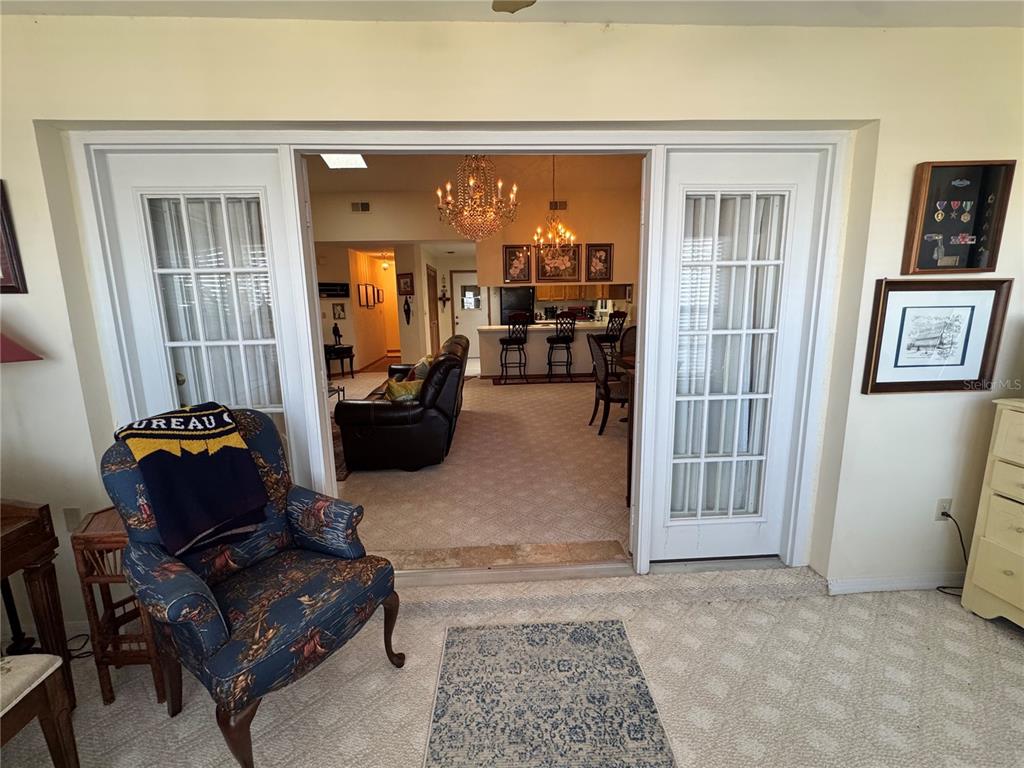 240 Division Street Clermont, FL 34711 - Photo 10 of 16 a living room with furniture and a window