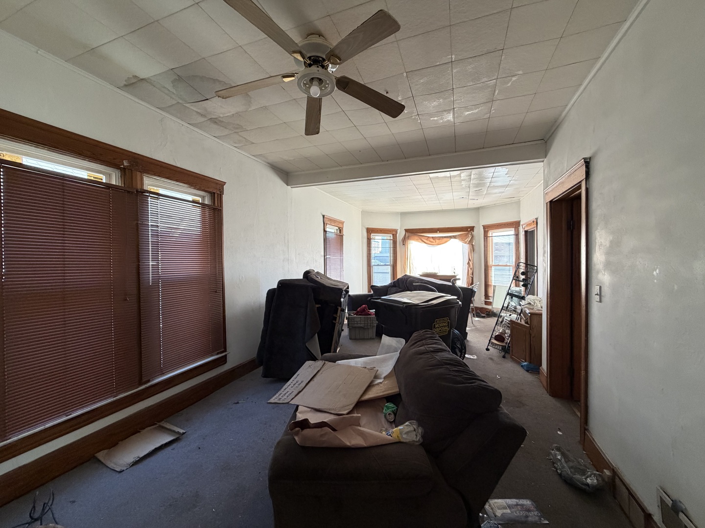 22-24 West Clark Street Freeport, IL 61032 - Photo 3 of 6 a living room with furniture and a window